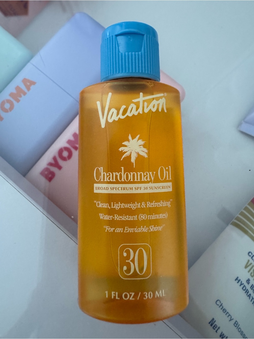 Vacation Chardonnay Oil SPF 30 Sunscreen - Amber Bottle with Blue Cap
